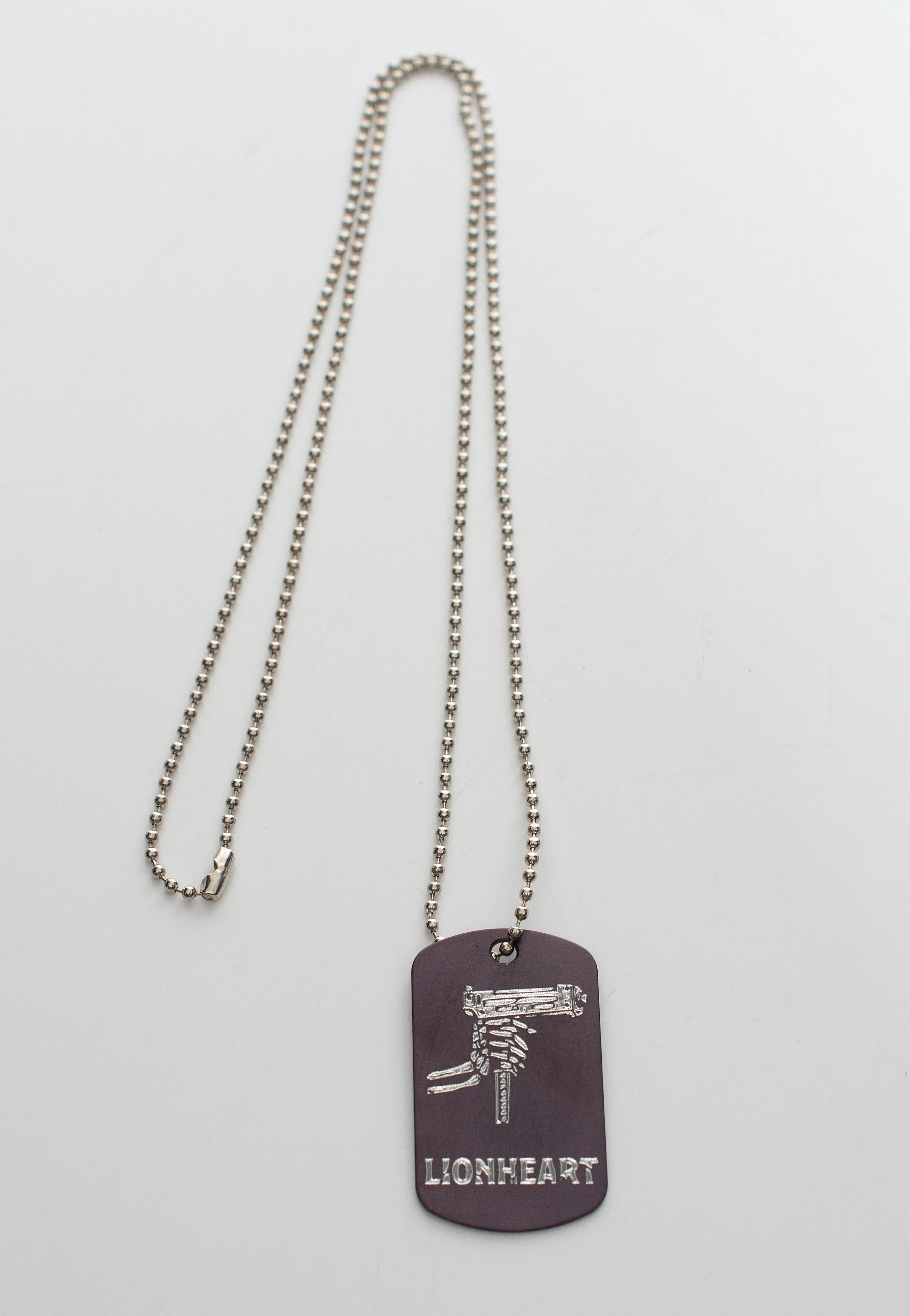 Lionheart - Uzi Black - Dog Tag | Neutral-Image